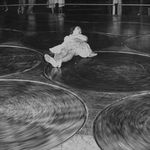"Woman trying the Human Pool Table ride during 4th of July celebrations at Coney Island." July 1942